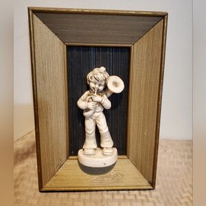 VTG framed chalkware/plaster boy figurine playing musical instrument Sears  Roe.